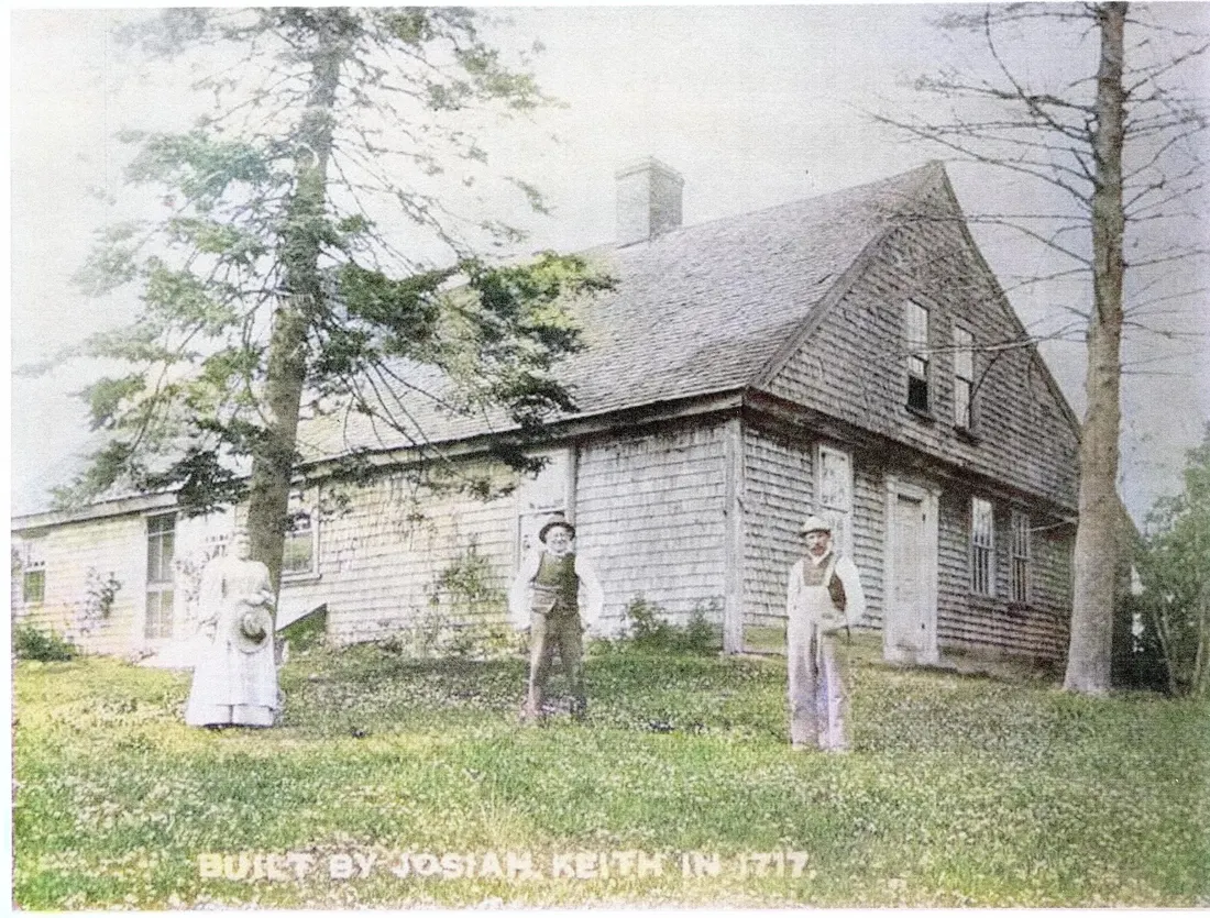 Circa 1886 photograph of the Josiah Keith House with family standing in front, captioned Built by Josiah Keith in 1717