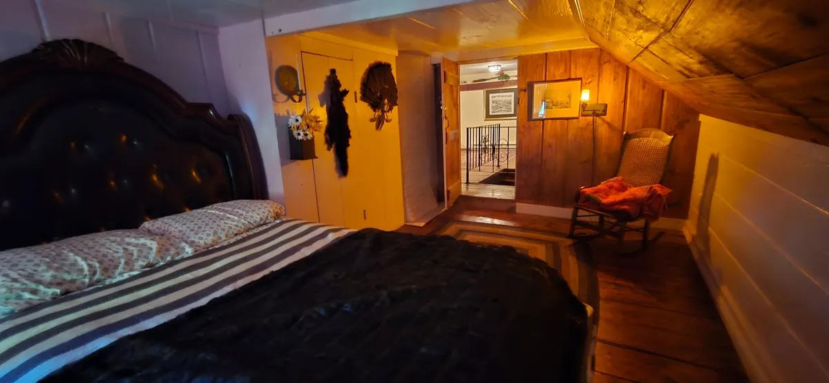 The Hunter Suite bed with a tufted headboard